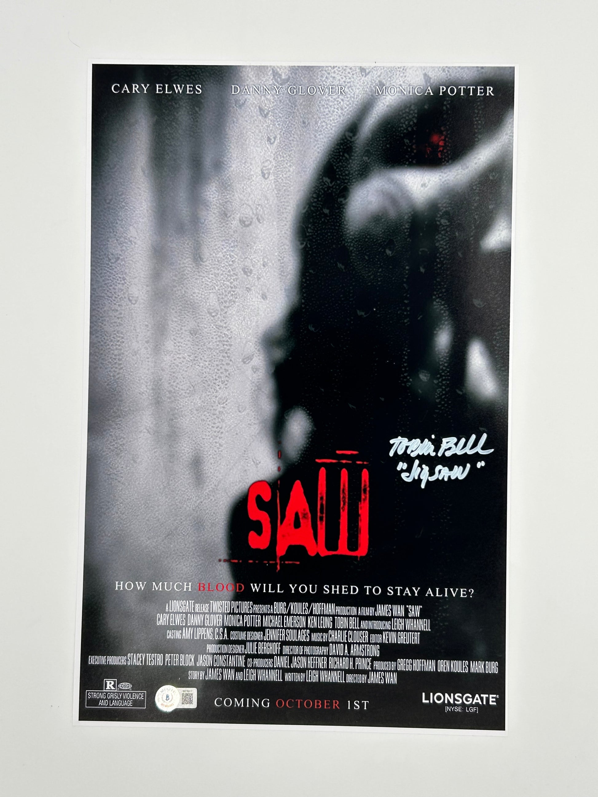 Photo of Tobin Bell Signed And Inscribed "Jigsaw" "SAW" 11x17 Poster (Beckett Witnessed) at InkedAuction.com.