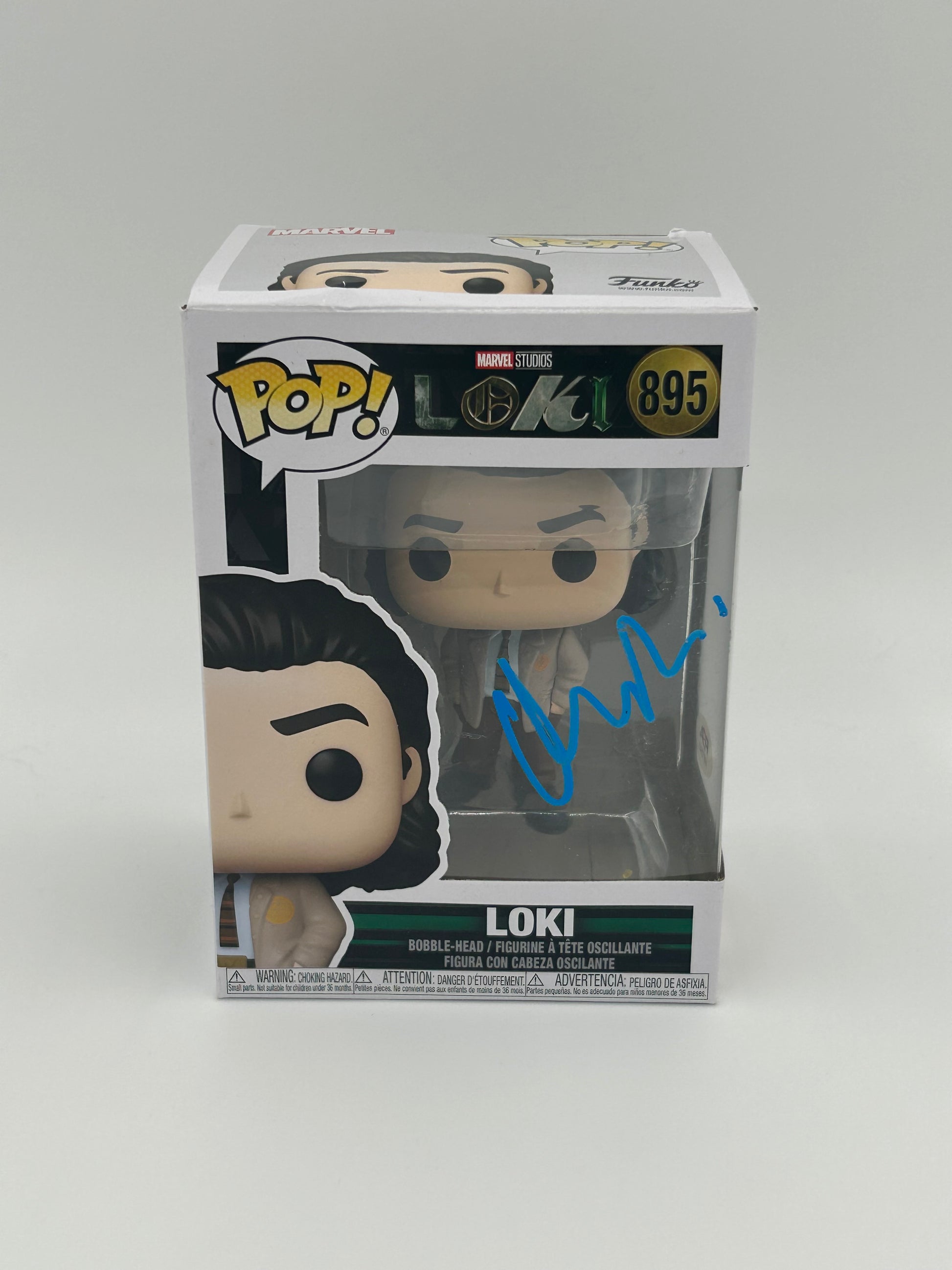 Photo of Matt Damon Signed Loki "Loki" #895 Funko Pop! Vinyl Figure (PSA) (See Description) at InkedAuction.com.