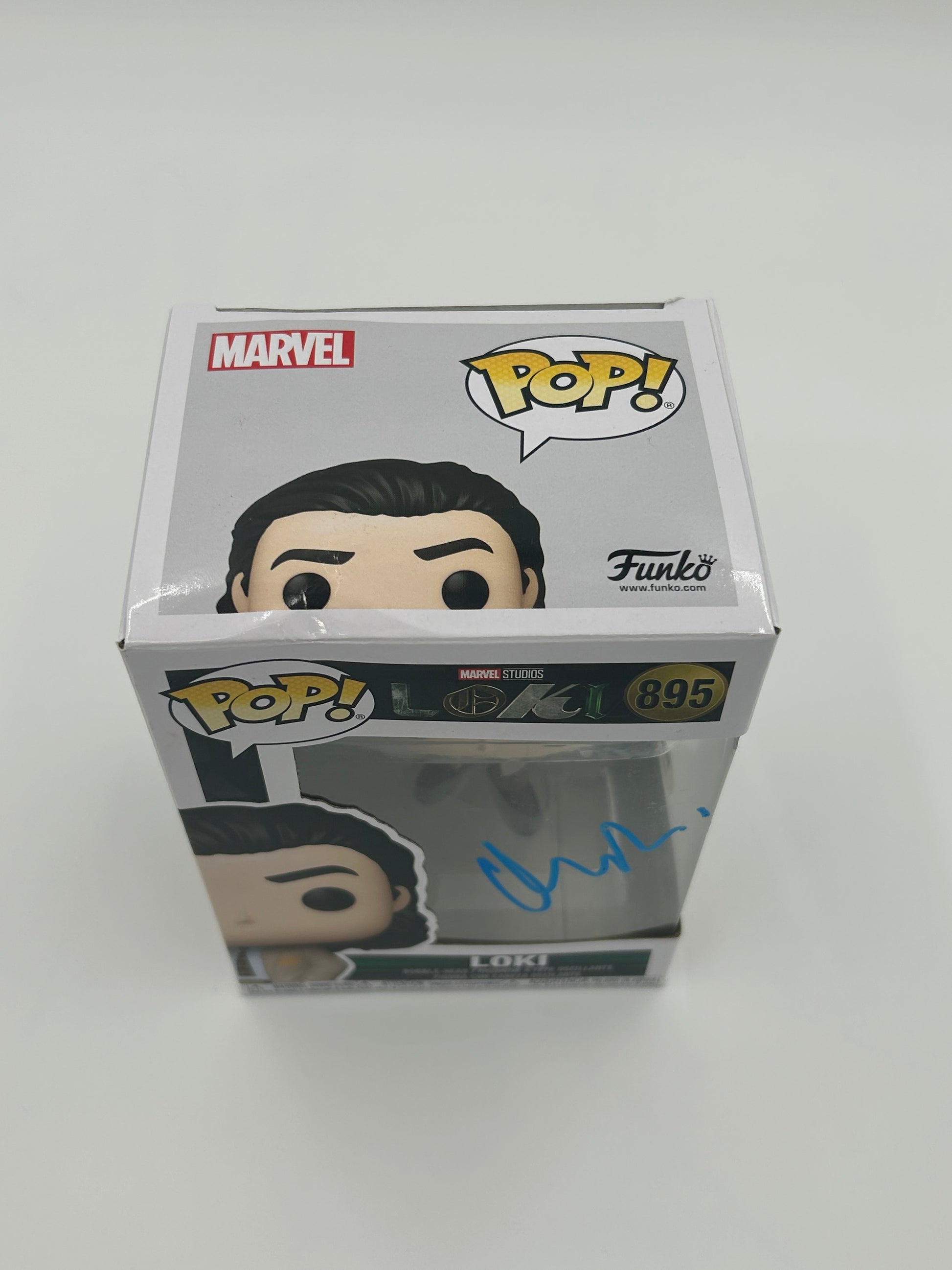 Photo of Matt Damon Signed Loki "Loki" #895 Funko Pop! Vinyl Figure (PSA) (See Description) at InkedAuction.com.