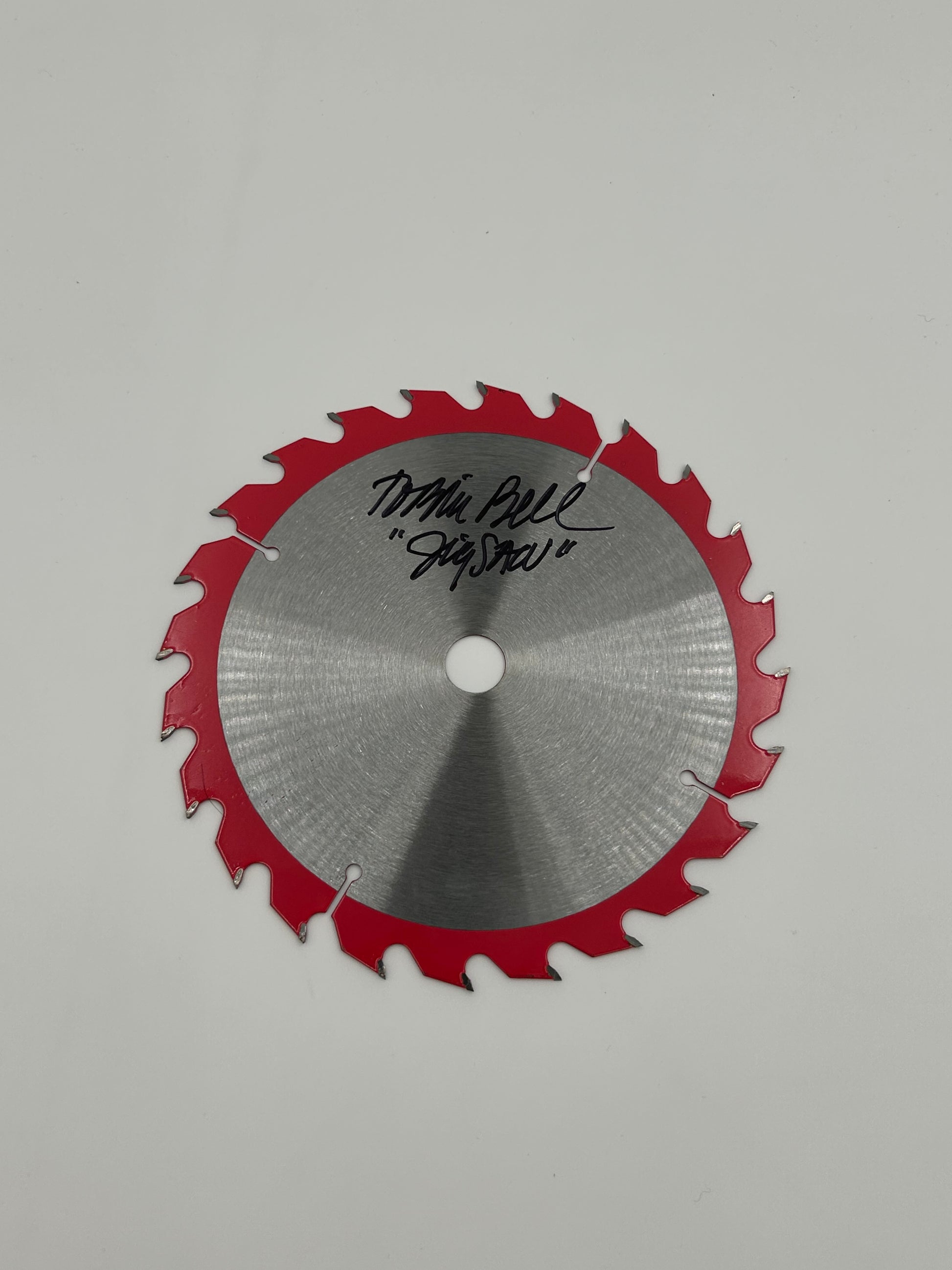 Photo of Tobin Bell Signed And Inscribed "Jigsaw" 6.5" Saw Blade (JSA Witnessed) at InkedAuction.com.