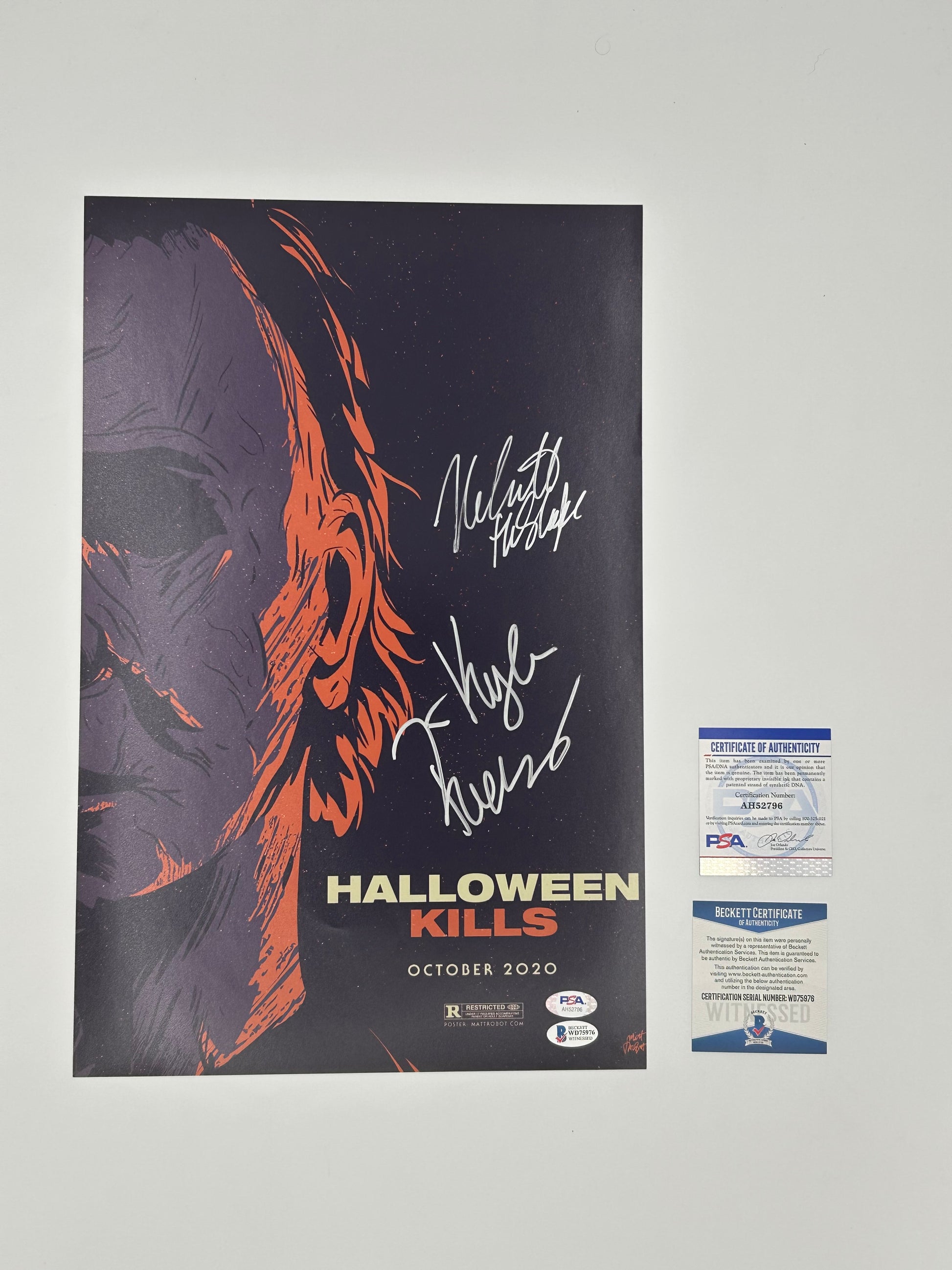 Photo of Nick Castle And Kyle Richards Signed "Halloween Kills" 11x17 Poster (Beckett Witnessed And PSA) at InkedAuction.com.
